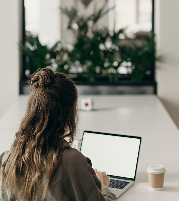 girl looking at computer