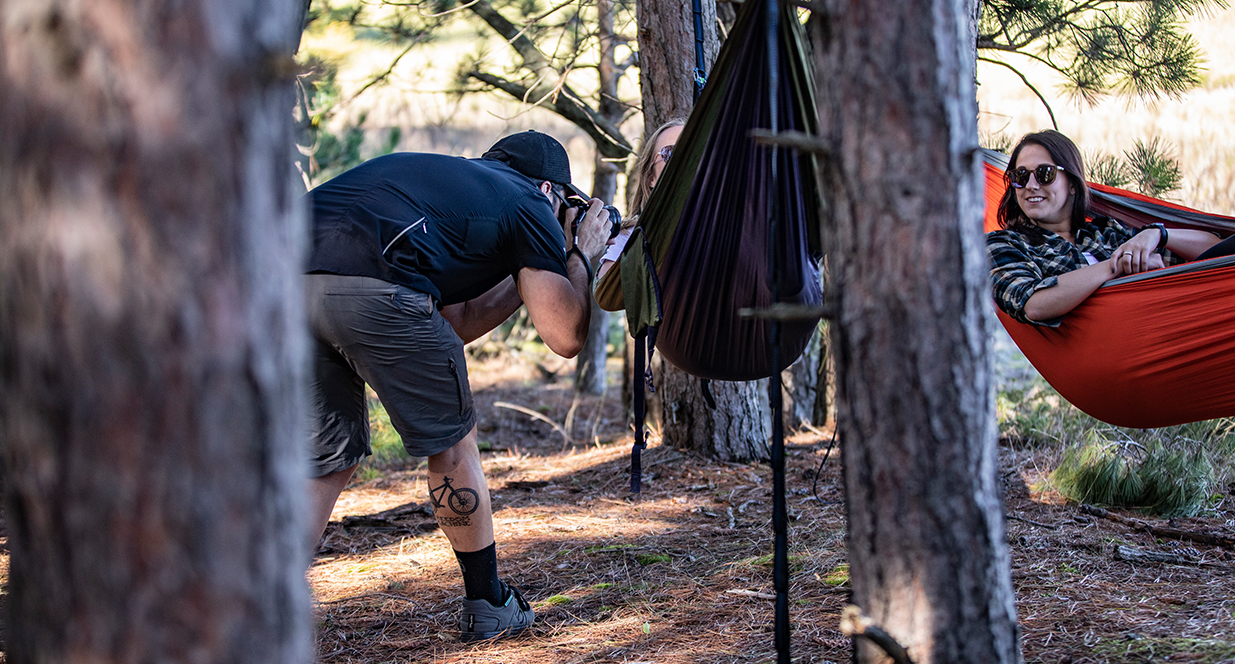 women hammocking in the trees