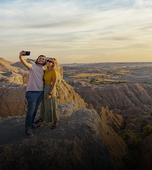 People taking a scenic selfie