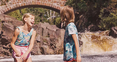 Two girls playing in water