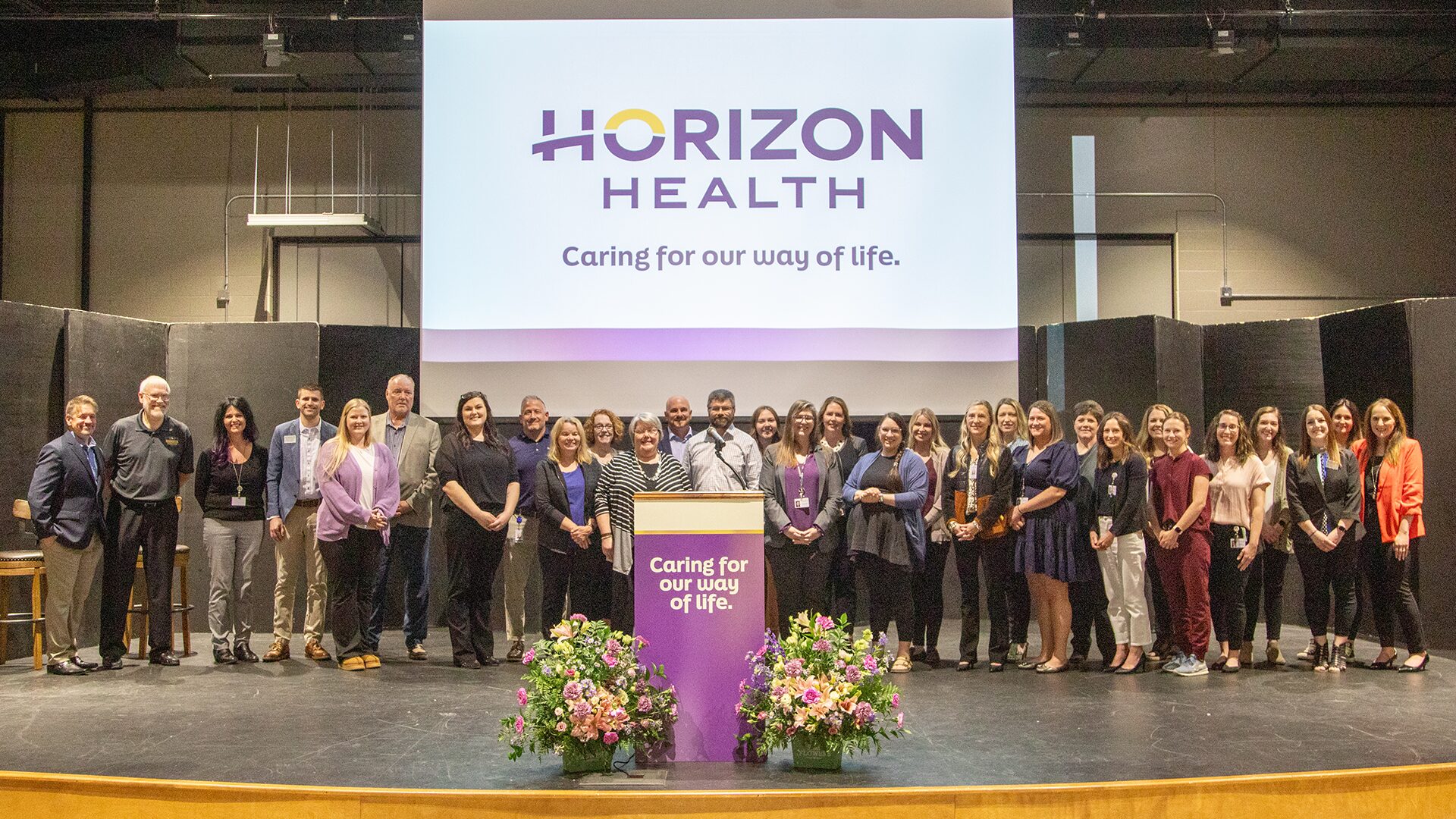 Horizon Health staff in a group photo at the brand launch event