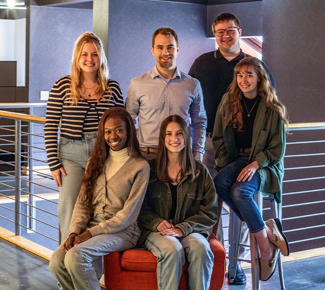 Group of interns sitting for photo